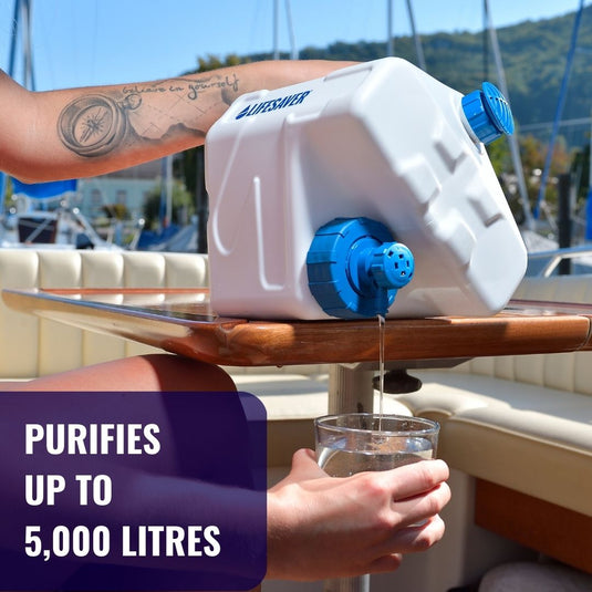 A LifeSaver cube filling a glass of water on a boat