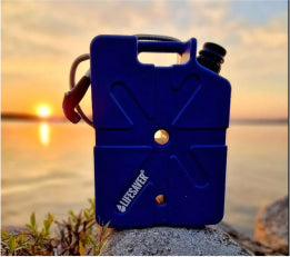 Blue jerrycan at sundown by a lake