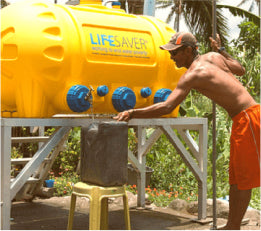 A large water container being filled from a LifeSaver C2 